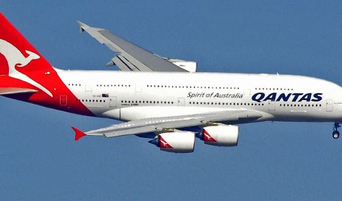 Qantas idles , more staff as COVID- cuts domestic flights