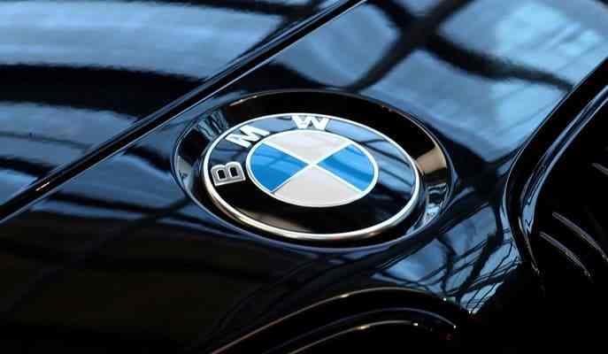 BMW cuts east German working hours to same as west
